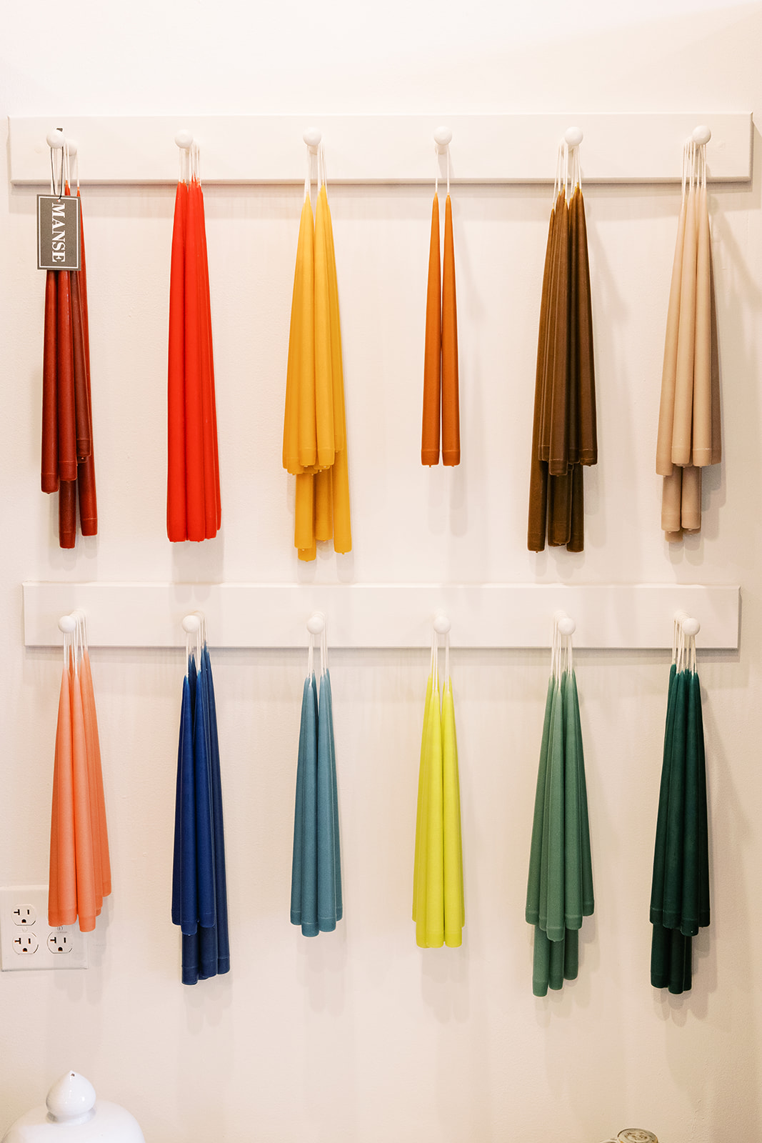 multi-color handmade taper candles. artisanal housewares store, georgetown dc, alexandria va. sarah bradshaw photography