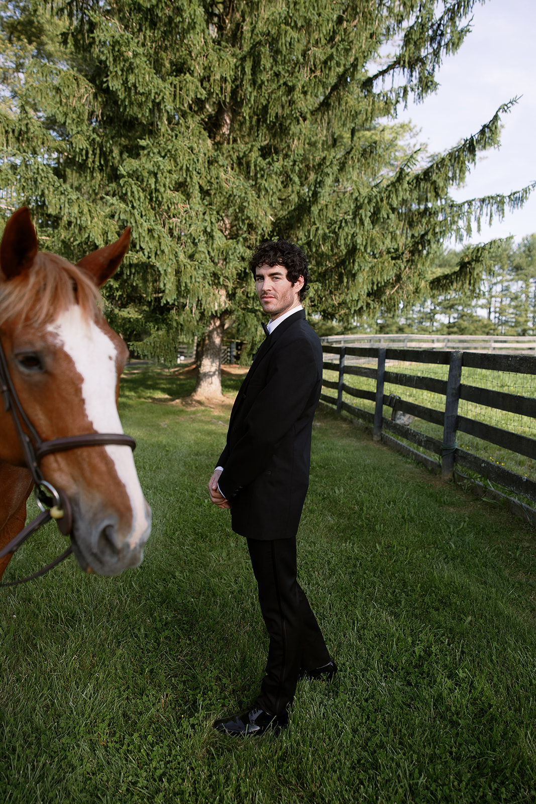 creative groom portrait with horse. chic equestrian wedding inspiration at Red Fox Inn, Middleburg Virginia. Sarah Bradshaw