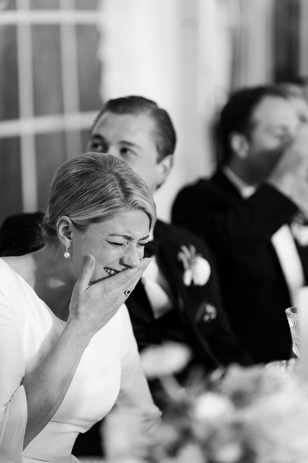 bride and groom laugh during wedding speeches. Classic timeless winter wedding, woodlawn manor, alexandria va. Sarah bradshaw photography