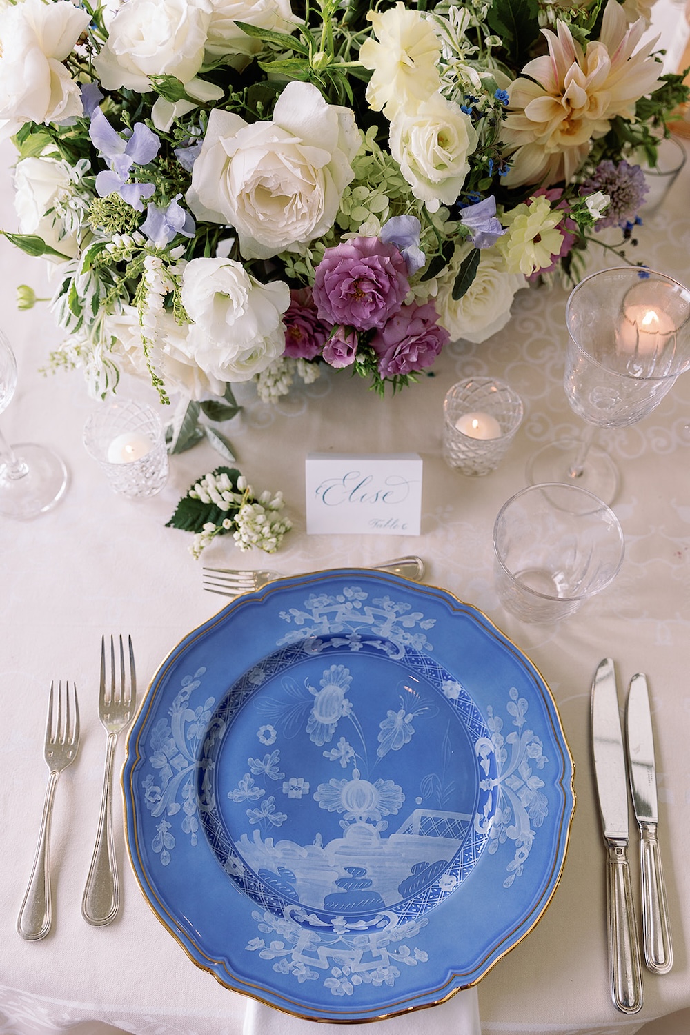 vintage china wedding welcome dinner place setting, colorful floral centerpiece. Elegant rehearsal dinner at the Hay Adams Hotel, Washington DC. Sarah Bradshaw Photography