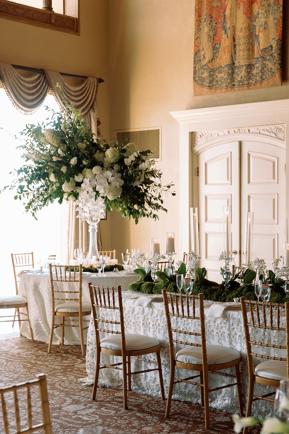 Tall white floral and greenery centerpiece. White wedding decor, textured table linen. Modern Luxe Washington DC wedding, Sarah Bradshaw Photography