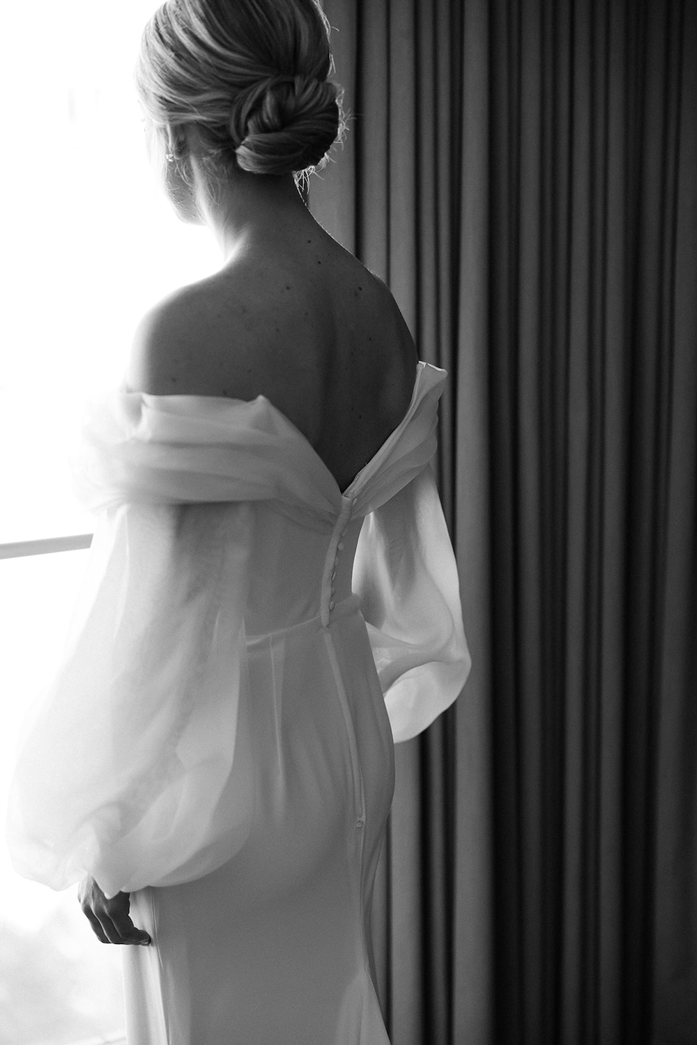 black and white bridal portrait, open v-neckline back of wedding dress, off shoulders. High end hotel ballroom wedding, The Fairmont, Washington DC. Sarah Bradshaw Photography