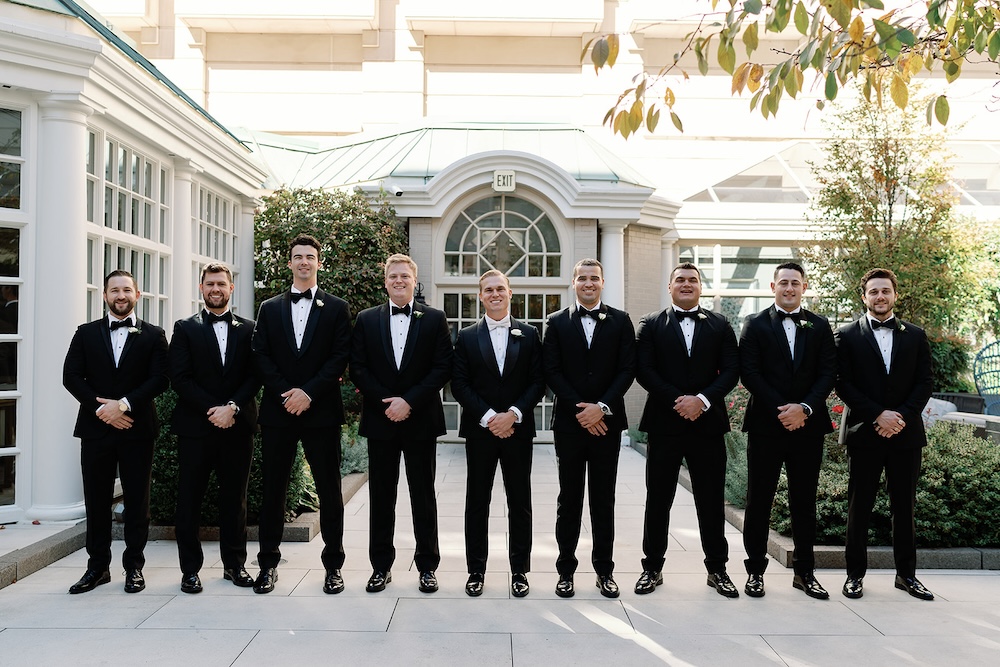 traditional groom and groomsmen wedding portrait, hotel courtyard. High end hotel ballroom wedding, The Fairmont, Washington DC. Sarah Bradshaw Photography