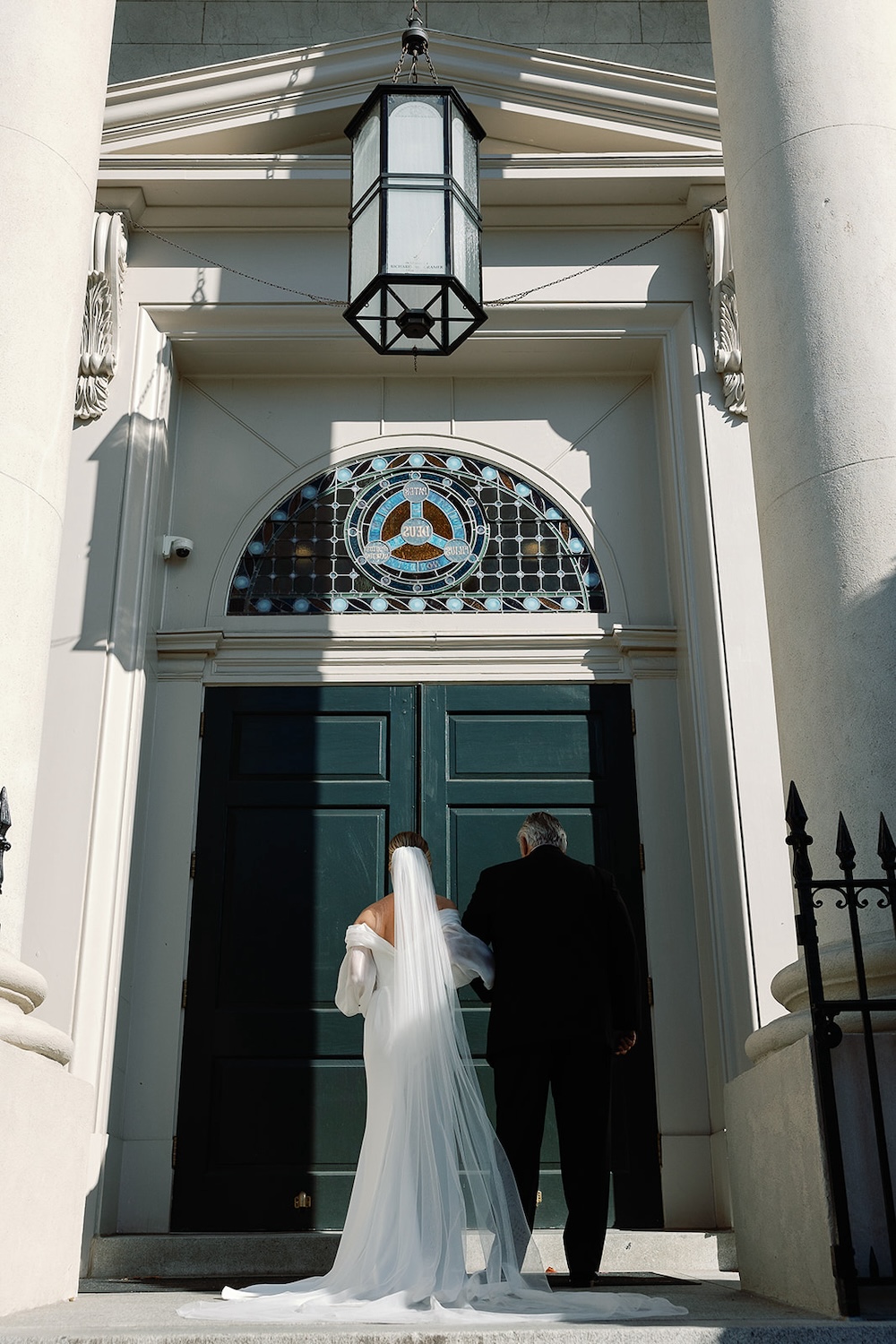 bride and father approach church for wedding ceremony. High end hotel ballroom wedding, The Fairmont, Washington DC. Sarah Bradshaw Photography