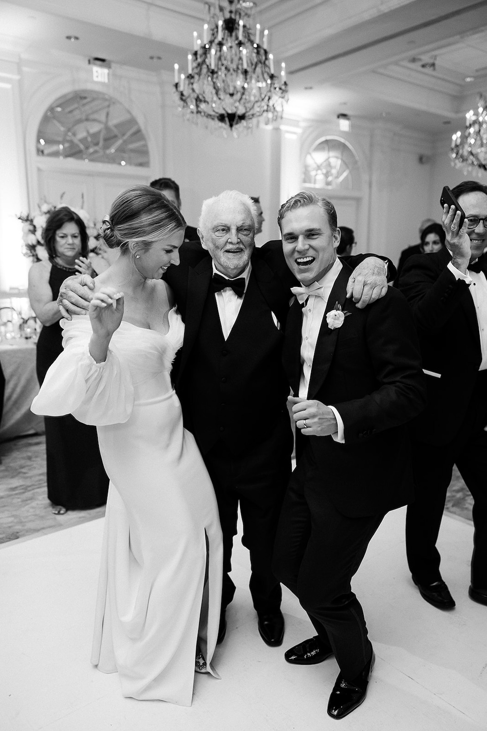 black and white portrait of bride and groom dancing. High end hotel ballroom wedding, The Fairmont, Washington DC. Sarah Bradshaw Photography