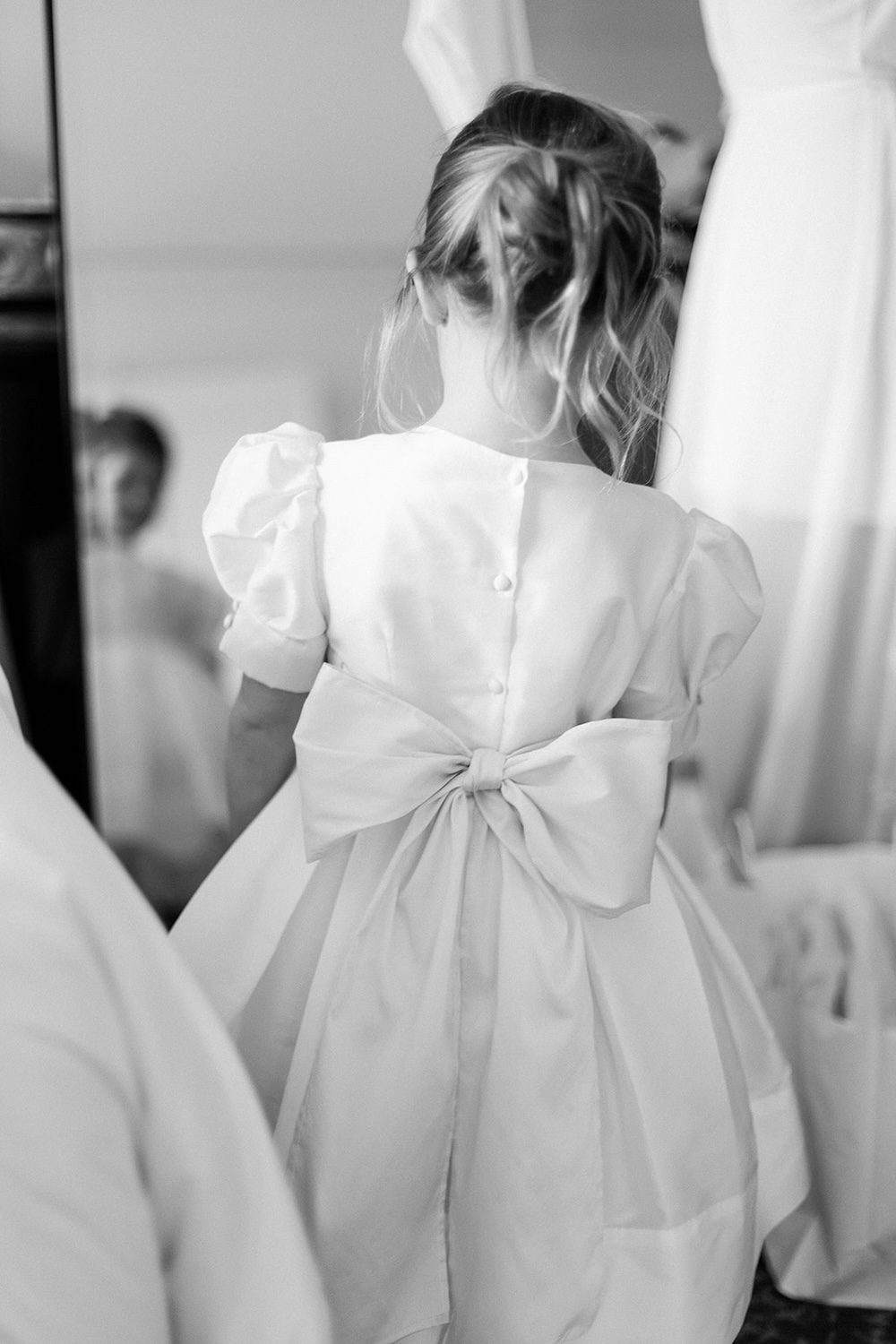 black and white portrait of flower girl with bow on dress. Classic timeless winter wedding, woodlawn manor, alexandria va. Sarah bradshaw photography