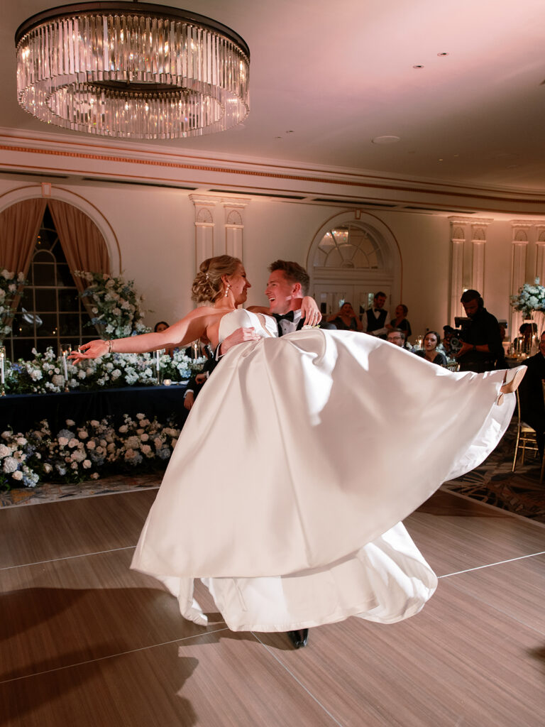 Crystal ballroom bride & groom first dance wedding reception at Historic Cavalier Hotel in Virginia Beach by Sarah Bradshaw Photography